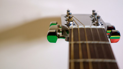guitar headstock with tuning pegs . color background