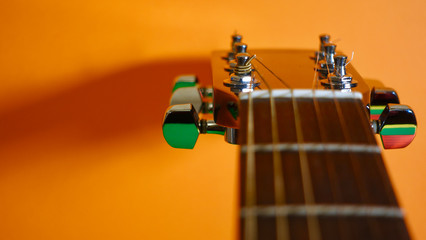 guitar headstock with tuning pegs . color background
