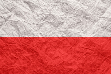 Poland flag on old crumpled craft paper.