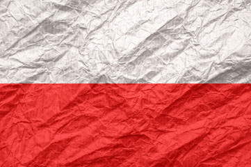 Poland flag on old crumpled craft paper.