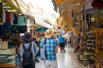 Tourists walking in a street market