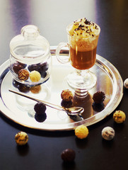cup of coffee and pralines