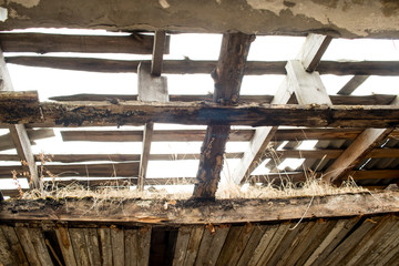 view of the remaining ceiling that collapses in an old abandoned building