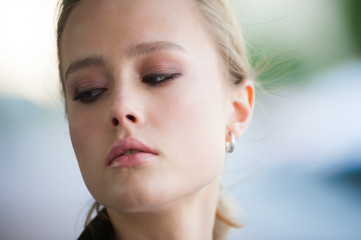 Portrait of beautiful young blonde woman with perfect make up