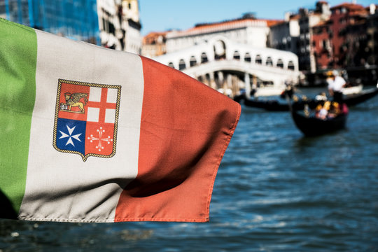 Close up of flag on a gondola on a canal in Venice, Veneto, Italy.