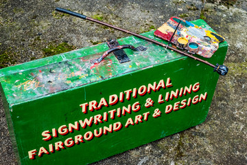 Painting materials on green metal toolbox