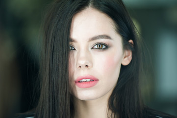 Close up portrait of beautiful young brunette woman 