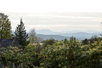 View of beautiful landscape, ominous sky and mountains in the background. Windermere, Lake District, Cumbria, UK -Image