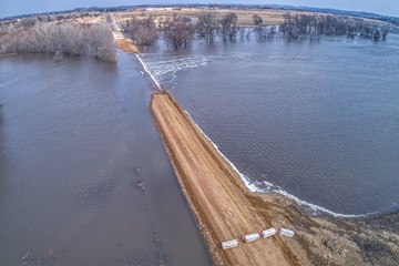 Rural Gravel Road in Big Sioux Recreation Area floods during spring melt