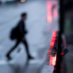  shines from the street on a rainy night in the city