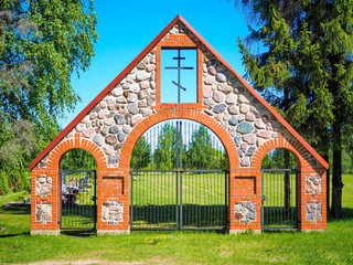 Kallaste, Estonia, Mai 19, 2018: Old Believers or Christian or Orthodox cemetery. Beautiful red...
