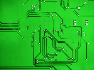 Close-up of printed electronic circuit board with processor and many integrated electrical components. Nanotechnology hardware system. Modern digital science concept. CPU welding or assembled on PCB.