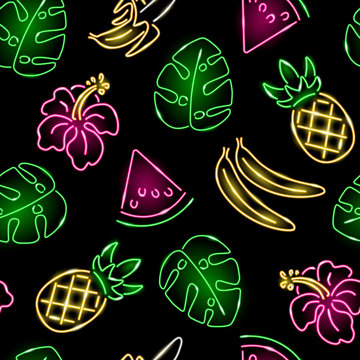 Seamless pattern with neon pineapple, banana, monstera leaf and hibiscus on black background. Exotic, summer, tropical, food concept. Vector 10 EPS illustration.