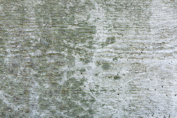 Obraz premium Grey and green abstract textured grunge wall background for use in design. Wall fragment with cracks, scratches 
