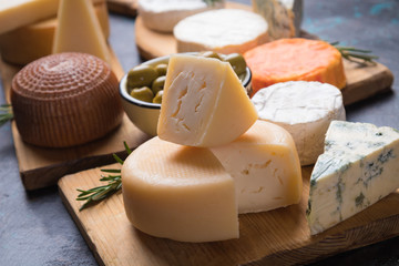 Aged cheese round and slices