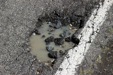 Street road asphalt pothole cracked fracture fragments surface texture layer