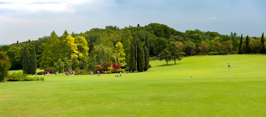 public park, ideal to spend a day with the family in full freedom immersed in nature. The freshly cut lawn is surrounded by trees of every species and color