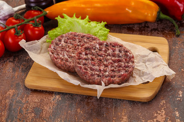 Raw burger cutlet