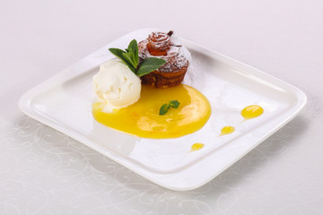 Tasty hot muffin with ice cream