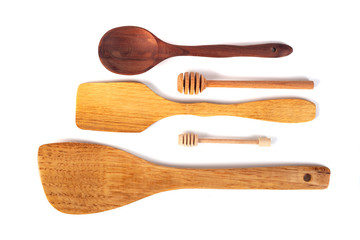 Various wooden kitchen tools isolated on white background