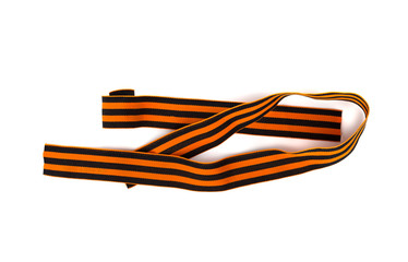 St. George ribbon on a white background. Black orange ribbon close up on a white background.