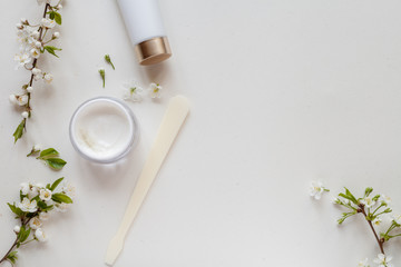 White background with organic cosmetics with natural ingredients. Top view.