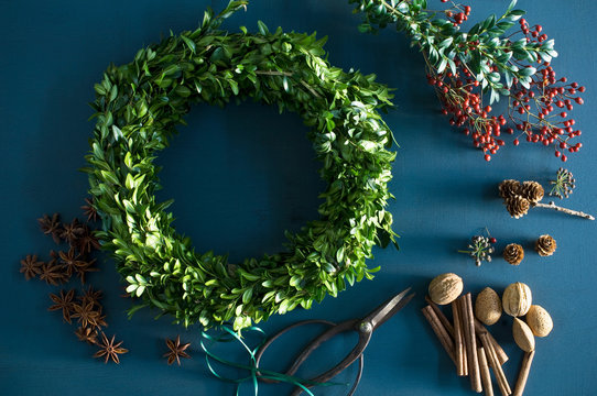 Self-made Advent wreath, box twigs, rosehip, star anise, cinnamon sticks, walnuts and almonds