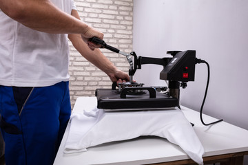 Printing on t shirt in workshop