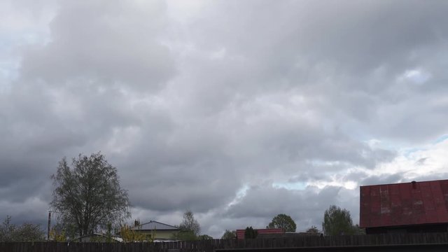 Moody sky during the windy and rainy weaher with low clouds - Hurricane and hail is coming soon