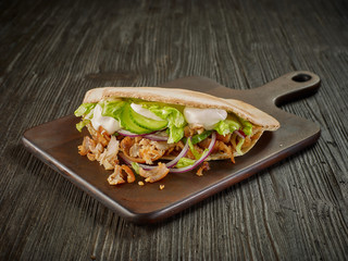 doner kebab on wooden table