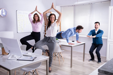 Businesspeople Doing Yoga