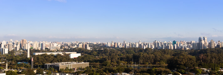 Panoramic view of the city of Sao Paulo with the Ibirapuera park and the Legislative Assembly of Sao Paulo in the foreground.