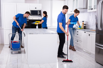 Janitors Cleaning Kitchen
