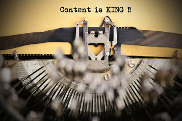 Content is king text written with old typewriting machine
