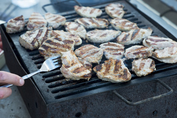 Pork steak meat grilled on barbecue