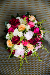 Buds of roses and peonies in a luxurious wedding bouquet