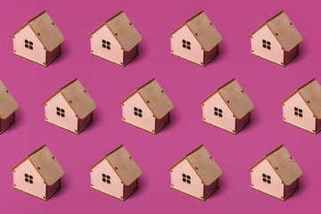 Minimal design with miniature wood toy house. Texture.