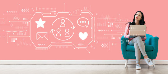 Social media with young woman using a laptop computer 