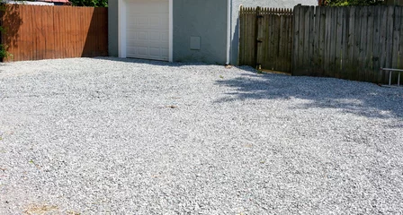 Foto op Canvas New gravel driveway in rear of residential home. © Noel