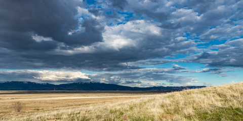 Big sky and foothills in the American west