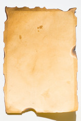 Old sheet of paper that has burnt edges