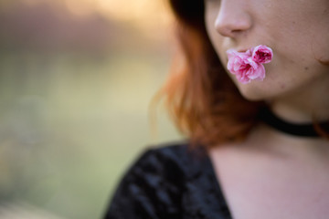 Face portrait close up - Happy young travel dancer woman enjoying free time in a sakura cherry blossom park - Caucasian white redhead girl - Dressed black chocker, black dress and black golfs