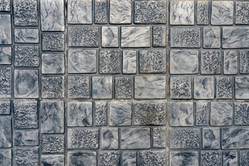 Grey concrete block cobble stone texture pattern background.