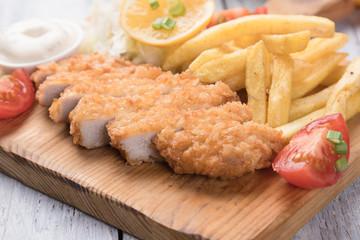 Breaded cutlet with french fries