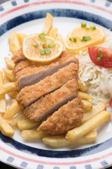 Breaded cutlet with french fries