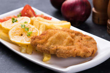 Breaded cutlet with french fries