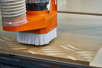 Processing of panels on the coordinate-milling woodworking machine with CNC.