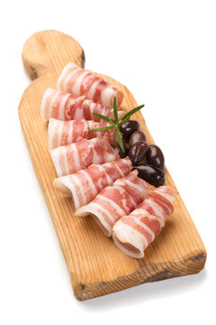 Rolls Of Pancetta Bacon Isolated On White