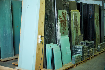 Fototapeta na wymiar warehouse of finished and packed doors, production of interior and metal doors