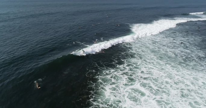 Aerial video of guy surfing. Drone view of surfer in Central America point break. Outdoor sports in lifestyle travel clip.